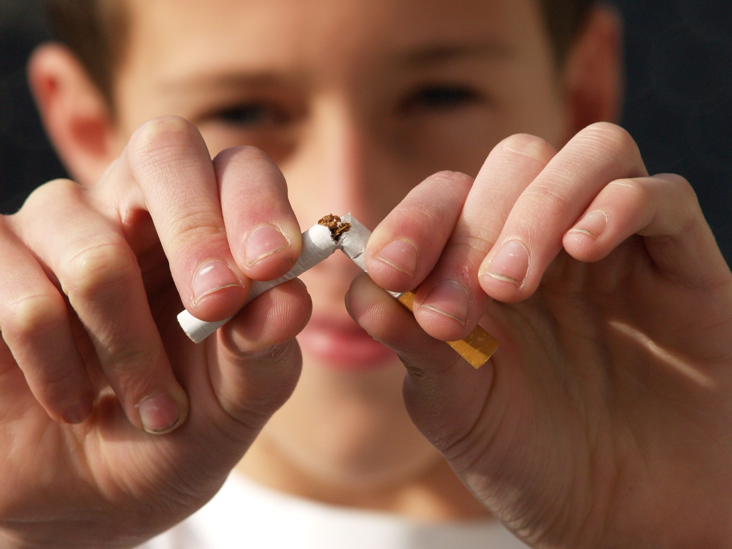 Creighton Dentist | Tobacco & Your Teeth: The Risks of Chewing and Smoking